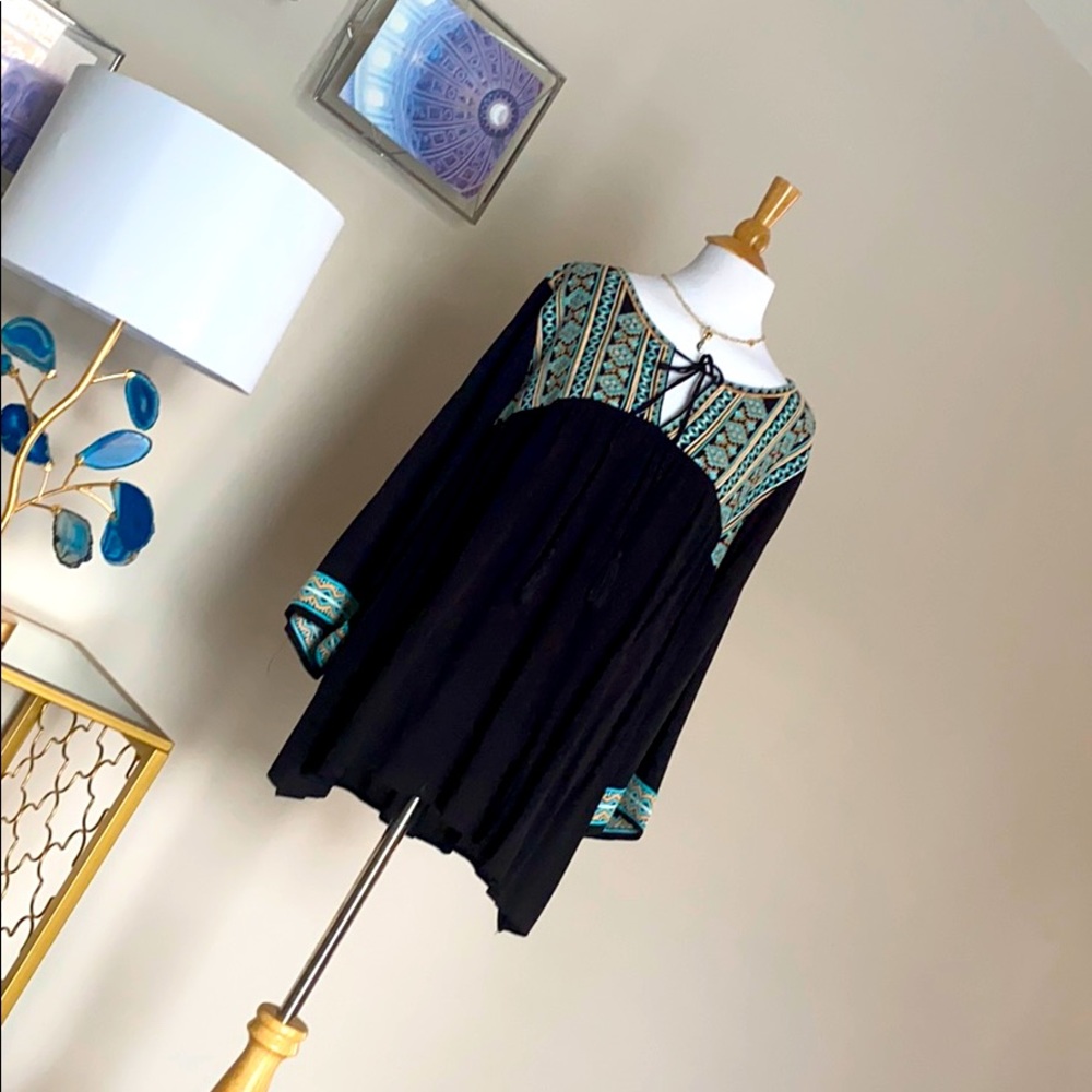 Boho chic embroidered top.